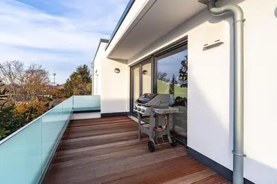 Ein Balkon oder eine Terrasse in der Unterkunft A&V Apartments Wunderschöne Penthouse Wohnung