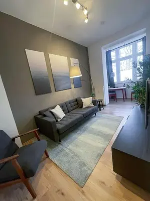 Ein Sitzbereich in der Unterkunft Modern Cozy apt. -with 2 TV, Netflix and work desk