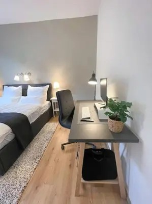 Ein Bett oder Betten in einem Zimmer der Unterkunft Modern Cozy apt. -with 2 TV, Netflix and work desk