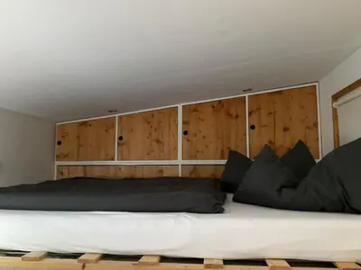 Ein Bett oder Betten in einem Zimmer der Unterkunft Tiny House Ruhr im PIER9 Tiny House Hotel