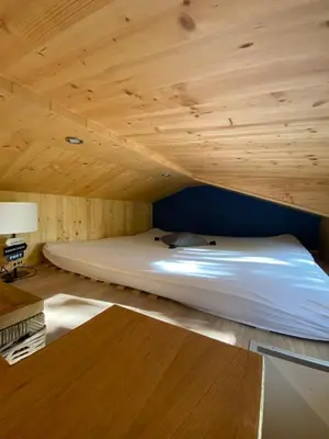 Ein Bett oder Betten in einem Zimmer der Unterkunft Tiny House Möhne im PIER9 Tiny House Hotel