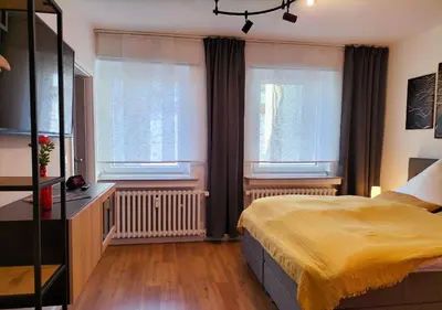 Ein Bett oder Betten in einem Zimmer der Unterkunft Living-Life, Klinik & Messe vor Ort, Wlan, Netflix