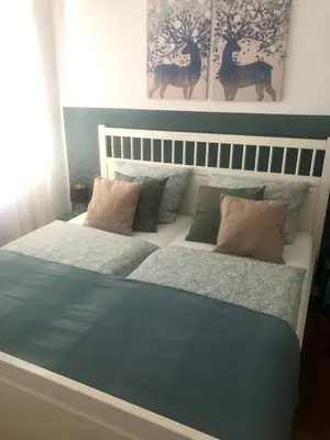 Ein Bett oder Betten in einem Zimmer der Unterkunft FeWo Ruhrnatur „Modern trifft Gemütlichkeit“