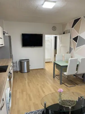 Küche/Küchenzeile in der Unterkunft Appartement La Vie en Rose