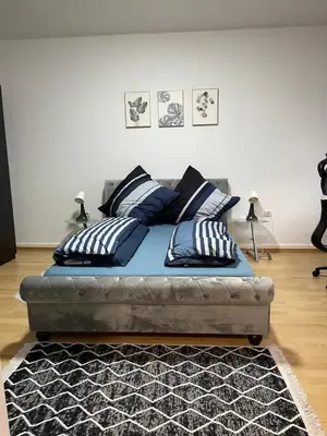 Ein Bett oder Betten in einem Zimmer der Unterkunft Appartement La Vie en Rose