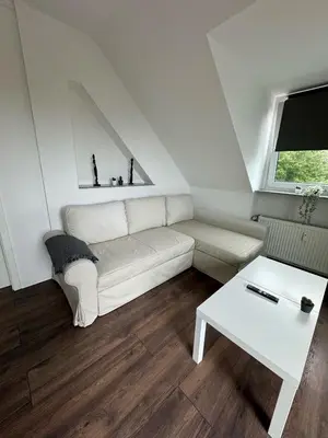 Ein Sitzbereich in der Unterkunft Hugo
