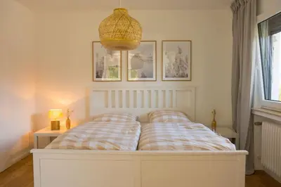 Ein Bett oder Betten in einem Zimmer der Unterkunft Ferien in Neviges