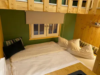 Ein Bett oder Betten in einem Zimmer der Unterkunft Tiny House Ahse im PIER9 Tiny House Hotel