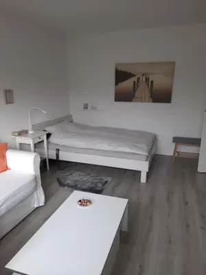 Ein Bett oder Betten in einem Zimmer der Unterkunft Happy Living