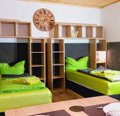 Ein Bett oder Betten in einem Zimmer der Unterkunft APARTMENTHAUS 