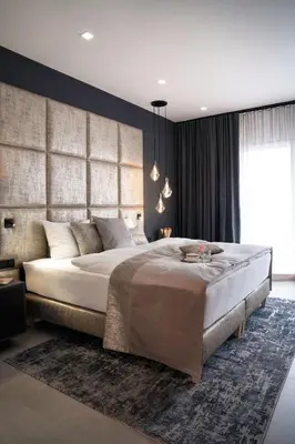Ein Bett oder Betten in einem Zimmer der Unterkunft THE NEWSHA SIGNATURE HOME