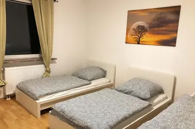 Ein Bett oder Betten in einem Zimmer der Unterkunft cozy Apartments with WiFi