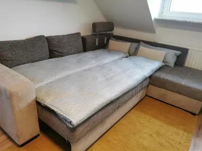 Ein Bett oder Betten in einem Zimmer der Unterkunft Moderne Ferienwohnung Iserlohn 1