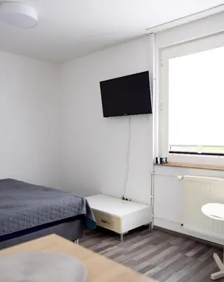 Ein Bett oder Betten in einem Zimmer der Unterkunft Exclusive Home Feeling Flat
