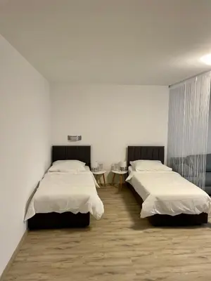 Ein Bett oder Betten in einem Zimmer der Unterkunft Ferienwohnungen Valerij