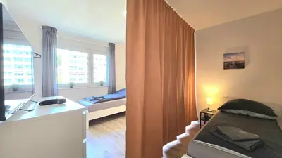 Ein Bett oder Betten in einem Zimmer der Unterkunft Modern 3-Room Apartment with Balcony & Free Parking & Free Wi-Fi in Hagen - HA03