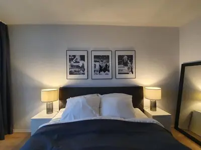 Ein Bett oder Betten in einem Zimmer der Unterkunft Penthouse mit einzigartigem Blick über Essen