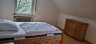 Ein Bett oder Betten in einem Zimmer der Unterkunft Bergblick