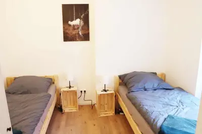 Ein Bett oder Betten in einem Zimmer der Unterkunft cozy 3-room Apartment