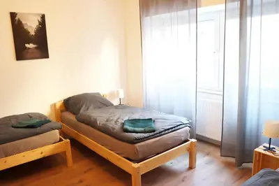 Ein Bett oder Betten in einem Zimmer der Unterkunft cozy 3-room Apartment