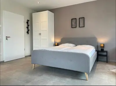 Ein Bett oder Betten in einem Zimmer der Unterkunft Privatunterkunft in Reken mit Balkon