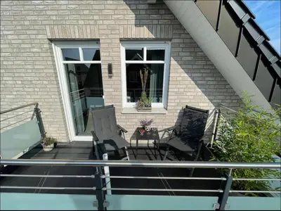 Ein Balkon oder eine Terrasse in der Unterkunft Privatunterkunft in Reken mit Balkon