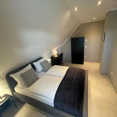 Ein Bett oder Betten in einem Zimmer der Unterkunft Privatunterkunft in Reken mit Balkon