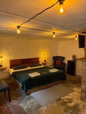Ein Bett oder Betten in einem Zimmer der Unterkunft Art Boutique Budget Apartment im Hinterhof Menden Altstadt mit Klimaanlage