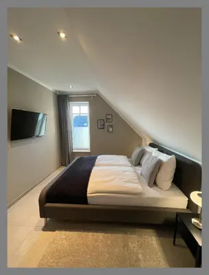 Ein Bett oder Betten in einem Zimmer der Unterkunft Privatzimmer Steinmetz in Reken