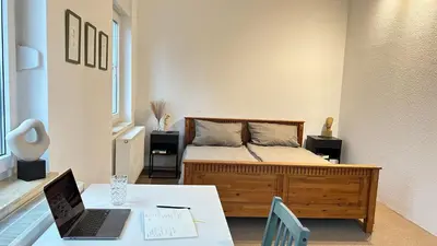Ein Bett oder Betten in einem Zimmer der Unterkunft Gemütliches Apartment