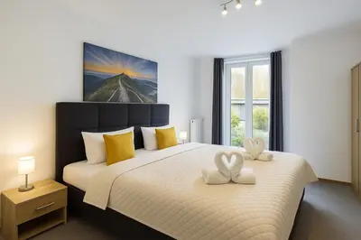 Ein Bett oder Betten in einem Zimmer der Unterkunft Sonnenschein Appartement in Wuppertal