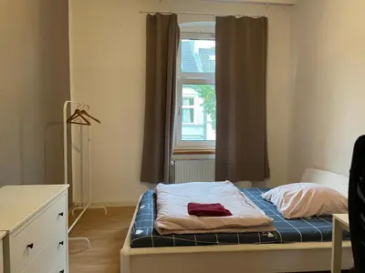 Ein Bett oder Betten in einem Zimmer der Unterkunft Lovely room in Düsseldorf nearly Düsseldorf Hbf