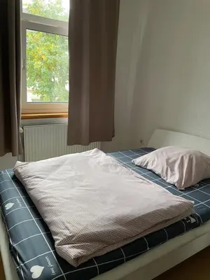 Ein Bett oder Betten in einem Zimmer der Unterkunft Lovely room in Düsseldorf nearly Düsseldorf Hbf