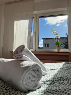 Ein Bett oder Betten in einem Zimmer der Unterkunft Hotel Breuer