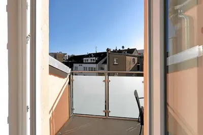 Ein Balkon oder eine Terrasse in der Unterkunft *City, Nähe Hbf, Kingsizebetten, Fitnessecke*