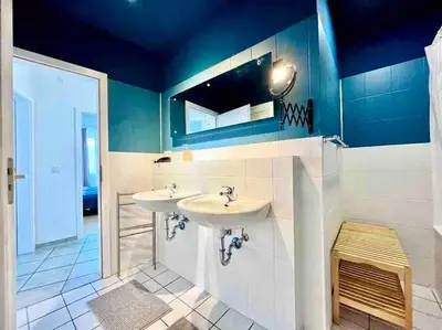 Ein Badezimmer in der Unterkunft Zentrales großzügiges Apartment mit Dachterrasse!
