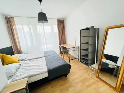Ein Bett oder Betten in einem Zimmer der Unterkunft Zentrales großzügiges Apartment mit Dachterrasse!