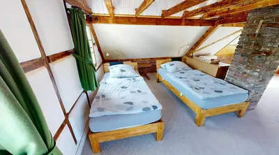 Ein Bett oder Betten in einem Zimmer der Unterkunft Haan-Ferienwohnung