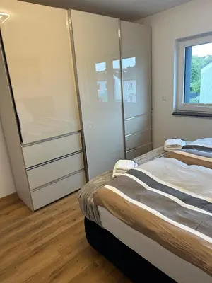 Ein Bett oder Betten in einem Zimmer der Unterkunft Villa Hilden