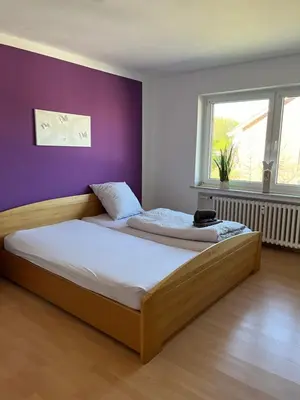 Ein Bett oder Betten in einem Zimmer der Unterkunft Apartment Geronimo