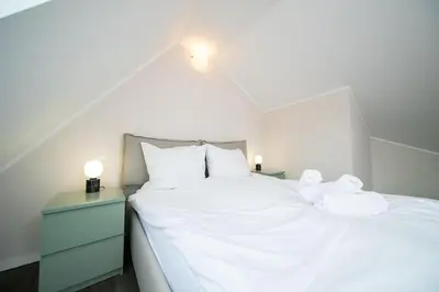 Ein Bett oder Betten in einem Zimmer der Unterkunft Favorite Stays -Suite and More - Altstadt