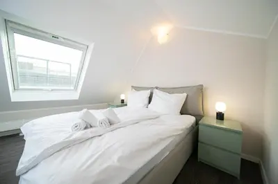 Ein Bett oder Betten in einem Zimmer der Unterkunft Favorite Stays -Suite and More - Altstadt