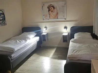 Ein Bett oder Betten in einem Zimmer der Unterkunft Samad Wohnen