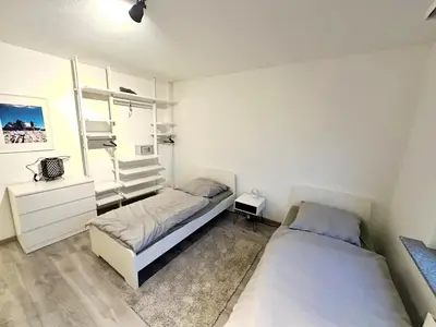 Ein Bett oder Betten in einem Zimmer der Unterkunft Cozy Apartments in Wuppertal