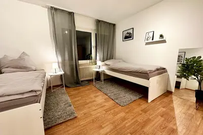 Ein Bett oder Betten in einem Zimmer der Unterkunft Cozy Apartments in Wuppertal