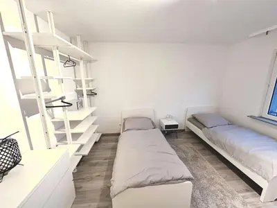 Ein Bett oder Betten in einem Zimmer der Unterkunft Cozy Apartments in Wuppertal