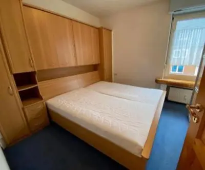 Ein Bett oder Betten in einem Zimmer der Unterkunft KM Apparts 1