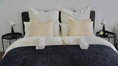 Ein Bett oder Betten in einem Zimmer der Unterkunft Zentral & Modern Nähe Düsseldorf und Köln