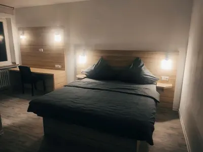 Ein Bett oder Betten in einem Zimmer der Unterkunft City Apartments Essen