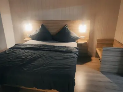Ein Bett oder Betten in einem Zimmer der Unterkunft City Apartments Essen